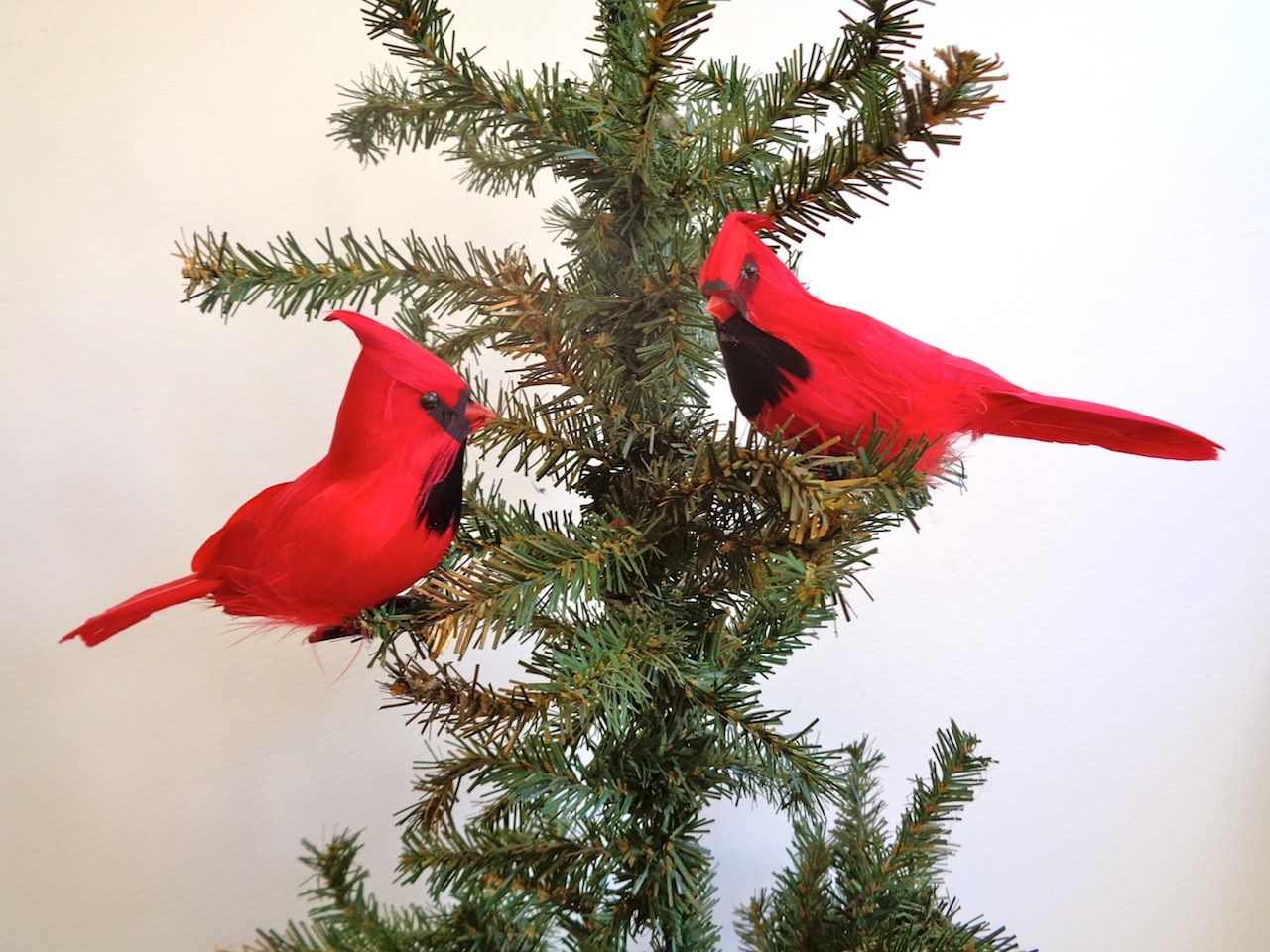 Decorating outdoors with cardinals for christmas