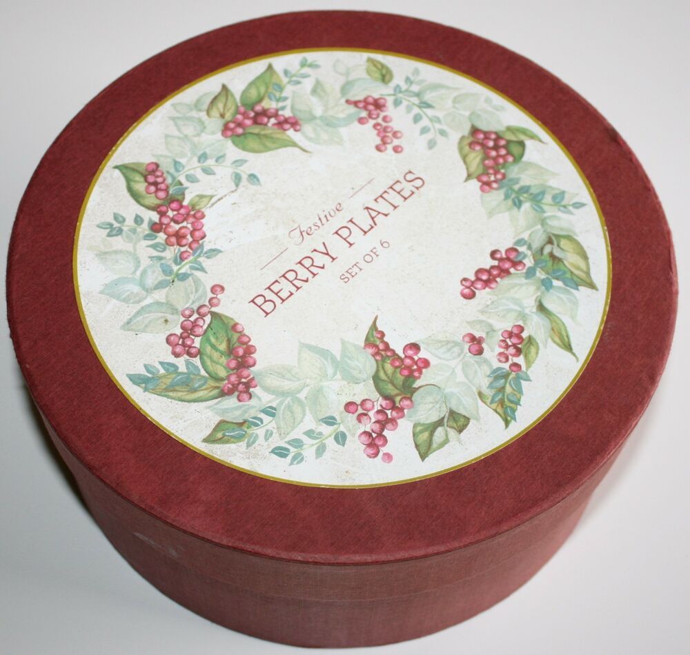 Four christmas decorated tin plates: copyright 2003 restoration hardware